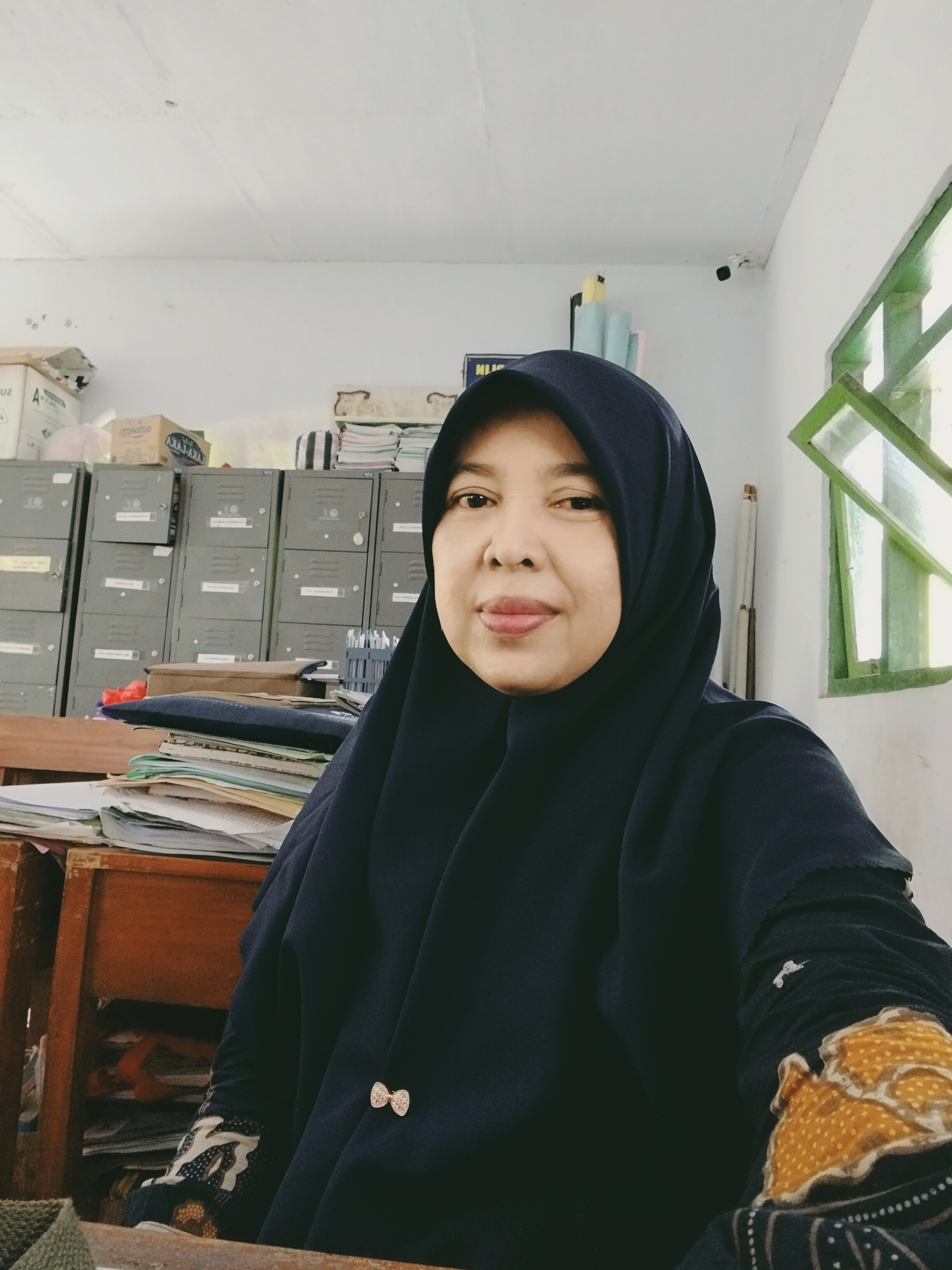 Emi Marliatun, S.H